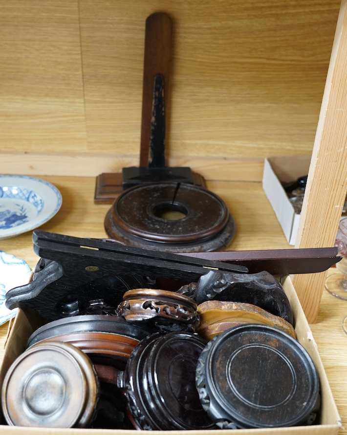 A collection of 19th century and later Chinese carved hardwood stands, largest 23cm diameter. Condition - varies